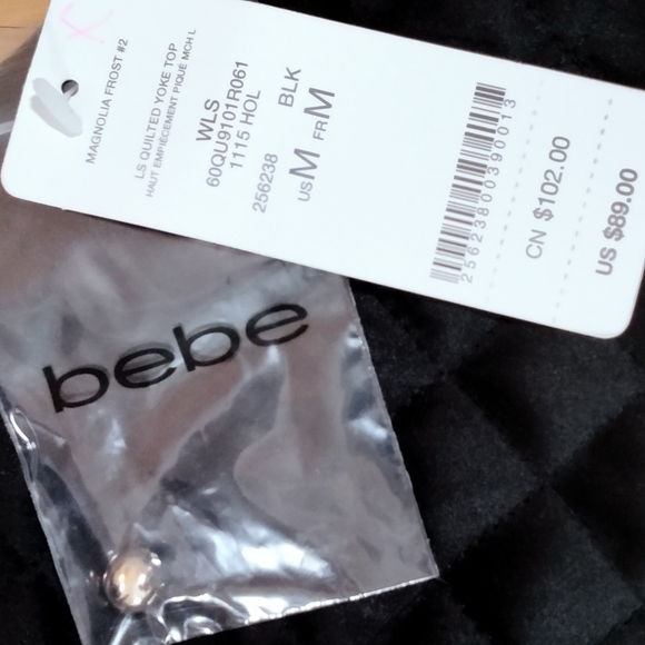 Bebe Quilted Yoke Top with Mesh - Picture 8 of 8